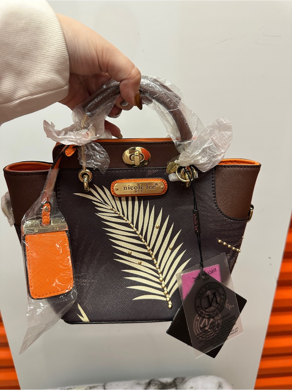 Nicole Lee Brown Palm-Print Satchel with Orange Accents